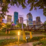 romantic things to do in houston - sunset image of houston skyline as seen from park